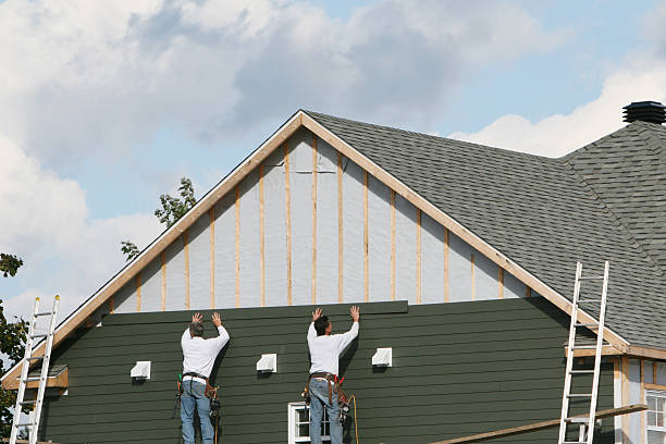 Professional Emergency Siding Repair technician working in Diamond, OH
